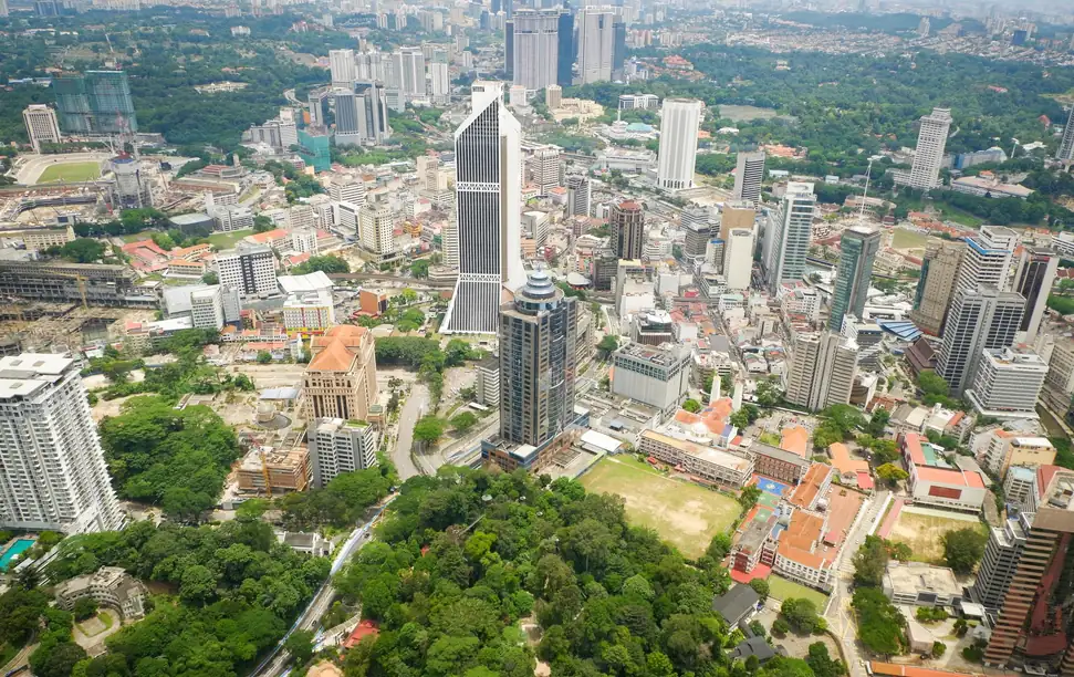 Aerial view of central Kuala Lumpur over the Bukit Nanas forest